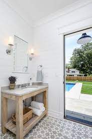 A full structure with 4 walls. 10 Tips A Michigan Lake House By Linc Thelen Pool House Bathroom Outdoor Pool Bathroom Outdoor Bathrooms