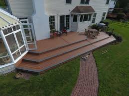Once you've selected your deck color, choose between one of two board profiles. Tiki Torch Deck With Island Mist Boards And Bronze Trex Reveal Railings Picture 7528 Decks Com