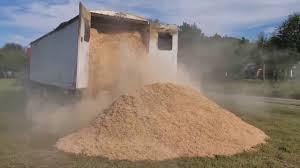 Likewise, how do you convert tons of soil to cubic yards? Sawdust Delivery 100 Yards Youtube