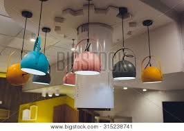 Maybe you would like to learn more about one of these? Modern Chandelier With Led Lamps Hanging On The Ceiling In The Interior Of The Room Inside The House Design Of Home Warm Light From Shades Poster Id 315238741