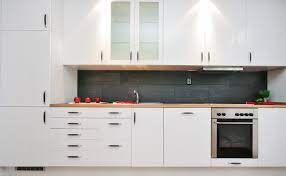 Like grout that is gray or dark color when using white tiles. Kitchen Remodeling Ideas White Cabinets And Butcher Wood Countertops Inner City Skyline