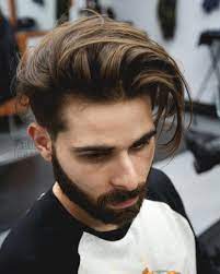 This variation only ties up some of the hair, so the knot is used. How To Grow Your Hair Out Men S Tutorial