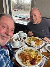 Me and my Franklin High School Franklin, NJ buddy Mark Van Tassel suffering  thru Retirement with another forced Breakfast at the diner. No one  explained to us just how stressful retirement would