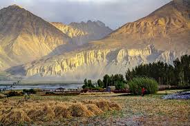 The terrain is difficult and the population sparse. Golden Mountains In The Pamir Mountains Looking Across The Border From Tajikistan Into Afghanistan Pamir Mountains Afghanistan Photography Landscape Paintings