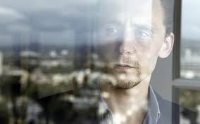 What color are tom hiddleston's eyes? Hd Wallpaper Tom Hidlestone Tom Hiddleston Actor Glass Hair Eyes Window Wallpaper Flare