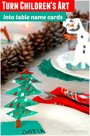 These christmas pinecone place card holders and place cards will add a special touch to your holiday table ~ even if it may be smaller this year. Turn Holiday Crafts For Kids Into Table Name Cards Playtivities