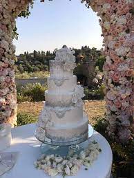 It's a chocolate cake, painted with chambord, with raspberry buttercream filling. Tuscan Weddingcakes Gatsby Wedding Cake