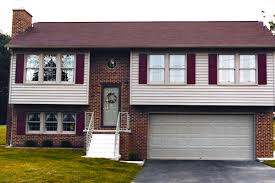 The living room and dining have a window wall with terrace access. Split Level House Plans 84 Lumber
