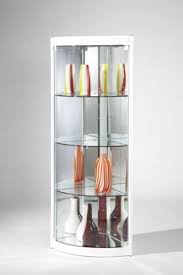 Glass, metal, and wood come together for a fascinating piece that never ceases to impress. Contemporary Corner Curio Cabinet Ideas On Foter