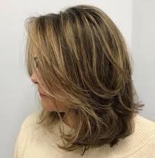 For a rounded shape, opt for side bangs and swooping layers that fall right at your shoulders. 70 Brightest Medium Layered Haircuts To Light You Up Checopie