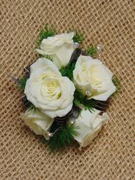 White Rose Wrist Corsage With Black By Avon Floral World Florist Gift Shoppe