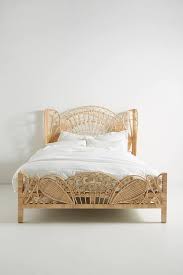 A mix of the charming, modern, and tried and true. Kinsella Natural Rattan Fanned Headboard Bed