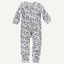 Sweet swiss dots cover this dobby cotton frock framed with whimsical flutter sleeves edged in lace. Baby Essentials Organic Baby Clothes Oliver Rain