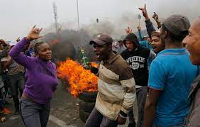 Shopkeepers fire on mob to protect their stores and ten people are killed in mall looting stampede as death toll in riots sparked by president zuma's jailing passes 40. South African Protesters Echo A Global Cry Democracy Isn T Making People S Lives Better