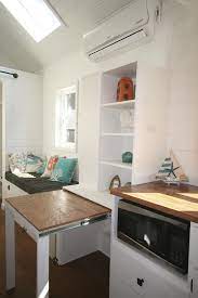 Interview Introducing The 160 Sq Ft Inaugural Tiny House By Graham Wales Tiny House Storage Tiny House Kitchen Diy Tiny House