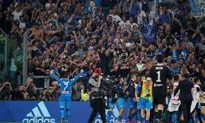 Fans already standing near the wall were crushed; Thousands Of Euphoric Napoli Fans Welcome Team Home Egypttoday