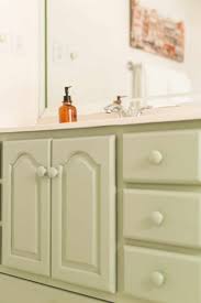 Painting cabinets in kitchen how to home depot ppg timeless primer zinsser diy remodel budget home decor bathroom stripping lowes tutorial. I Painted Our Bathroom Vanity A Beautiful Mess