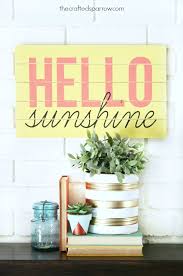 Daisy 'love begins at home' wood wall sign with picture saying quote #ad. 9 Cute And Easy Diy Summer Signs Shelterness