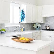 In this kitchen we renovated, our client wanted to make an overall updated yet timeless statement with the countertop and backsplash. Off White Cabinets With White Backsplash Design Ideas