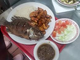Attieki Whole Fish With Tomatoes Onions Cucumbers Kissed With Vinegar And A Side Of Sweet Picture Of Mama Ti S African Kitchen Brooklyn Park Tripadvisor