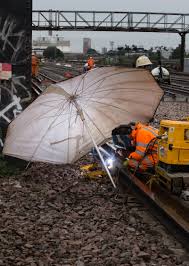 When the second bank holiday in may was moved to the last monday in may back in 1971, it was never given an official name. Engineer Braving The Elements At London Bridge Late August Bank Holiday