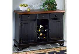 They can be as simple as a bar cart or as grand as a dining room storage cabinet. Aamerica British Isles Dining Storage Server Buffet With Wine Glass And Bottle Storage Novello Home Furnishings Servers