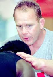 Wrestling coach emphasizes the positive