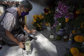 Families travel to Mexico to honor dead for Día de Muertos