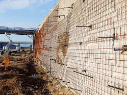 The design process for a segmental retaining wall typically has a wall design engineer or site civil engineer responsible for the wall design envelope. Structurae En Mesh Was Anchored Vibration Free At The Retaining Walls And Then Shotcreted