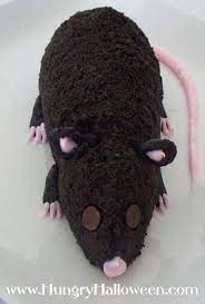 This Rodent Cookie With Cream Cheese Innards Halloween Cheese Ball Halloween Chocolate Halloween Chocolate Recipe