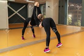 You will find options suitable to attend a wedding, formal ones for a business meeting, and even. Beautiful Woman Leaned Towards The Mirror And Bent Over Doing Stock Photo Picture And Royalty Free Image Image 143430805