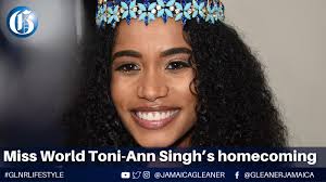 The reigning Miss World, Toni-Ann Singh, was in for a pleasant surprise  upon her return to the island yesterday. She received a sunshine greeting  from the newly crowned Miss Jamaica World, Khalia