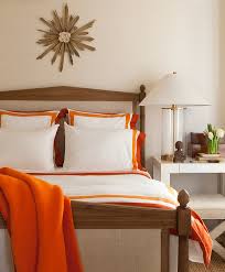 For instance, bed linens that have orange designs against a white background add visual interest. White And Orange Bedding Contemporary Bedroom Benjamin Dhong
