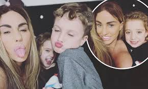 Katie Price shares and swiftly DELETES snaps of herself with youngest  children Jett, 8, and Bunny, 9