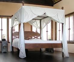 Bedroom furniture is traditionally arranged according to a few general rules. Teak Canopy Bed With Mosquito Net A Colonial Style Decoration