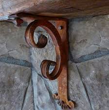Hand forged industrial farmhouse brackets made for wood mantels, shelves, countertops, etc. Wrought Iron Shelf Brackets Home Decor Shoreline Ornamental Iron