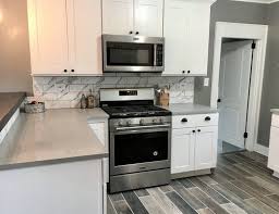 Modern Farmhouse Style Kitchen Remodel By Blankspace Llc Pittsburgh Pa Reclaimed Wood Look Fl White Shaker Cabinets Kitchen And Bath Design Cheap Countertops
