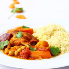 Serve the chicken tagine on top of a generous helping of couscous, with toasted flaked almonds, chopped fresh coriander and the remaining lemon zest scattered over. Slow Cooker Chicken Tagine Searching For Spice