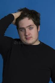 When i was a teenager i thought about having cute babies with one but that was surreal. Blue Eyed Teenager Boy Combing His Hair With His Right Hand Stock Photo Image Of Jumper Teenager 115911832