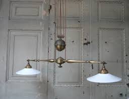 These fittings do exactly as the name states! Vintage 1910 Double Rise And Fall Pendant Light Beautiful Ceiling Pendant Lights Pendant Light Ceiling Lights