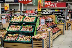 Poze : clădire, reclamă, alimente, legume şi fructe, piaţă, piata de desfacere, Afaceri, cumpărături, băcănie, stand, rafturi, supermarket, centru comercial, a cumpara, magazin alimentar, comerţ, branding, consumerismul, delicatese, produse, marketing ...