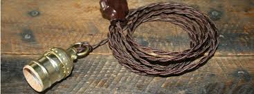 The matte black finish components complement most decors. What Are Swag Pendant Lamps Best Ways To Use Them Nostalgicbulbs Com