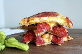 Replay pizzadilla is the best of both worlds. Pizzadilla Pizza Quesadilla Tasty Kitchen A Happy Recipe Community