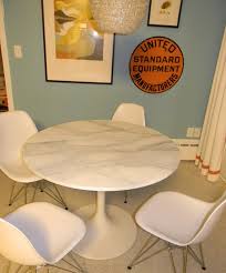 Round tables often require more space than rectangular ones, as they are perceived as being bigger. Gorgeous Shiny Things How To Happy Hour Faux Carrara Marble Ikea Hack