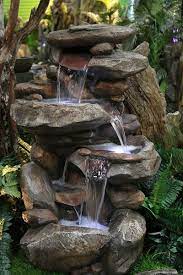 Backyard water fountains and waterfalls can be built by using the walls in backyard to become space in making waterfall feature. Alpine Win316 Rock Waterfall Fountain With Led Light Diy Garden Fountains Water Fountains Outdoor Fountains Outdoor