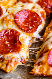 Cast Iron Pan Pizza Recipe Pizza Hut Copycat From The Food Charlatan Make Pizza At Home That Tastes Just Like Pizza In 2020 Pizza Recipes Food Charlatan Pan Pizza