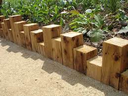 A flower garden or floral garden is any garden where flowers are grown and displayed. Vertical Railway Sleepers Google Search Wooden Garden Edging Wood Garden Edging Outdoor Garden Decor