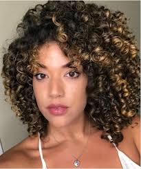 Repeat until that section of hair is free of tangles, then move the comb slightly higher up. 9 Women Share How They Went From Heat Damage To Healthy Curly Hair