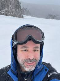 Snowboard parents at Waterville Valley sharing photos