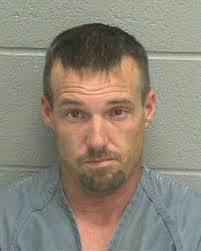 Driver accused of trying to run over man